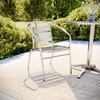 image:imageFlash Furniture Lila Commercial Aluminum IndoorOutdoor Restaurant Stack Chair with Triple Slat Back and ArmsSet of 1