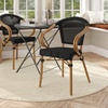 image:imageFlash Furniture Marseille IndoorOutdoor Commercial Bistro Stack Chair  Curved Arms  BlackWhite Textilene Back and Seat  LT NAT Bamboo Print Metal FrameBlackNatural Frame