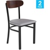 image:imageFlash Furniture Wright Commercial Dining Chair  Walnut Finish Wood Boomerang Back  Black Vinyl Seat  500 LB Capacity Black Steel Frame  Integrated FootrestWalnut Wood BackGray Vinyl Seat