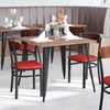 image:imageFlash Furniture Wright Commercial Dining Chair  Walnut Finish Wood Boomerang Back  Black Vinyl Seat  500 LB Capacity Black Steel Frame  Integrated FootrestWalnut Wood BackRed Vinyl Seat