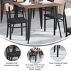image:imageFlash Furniture Wright Commercial Dining Chair  Walnut Finish Wood Boomerang Back  Black Vinyl Seat  500 LB Capacity Black Steel Frame  Integrated FootrestNatural Birch Wood BackBlack Vinyl Seat