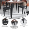 image:imageFlash Furniture Wright Commercial Dining Chair  Walnut Finish Wood Boomerang Back  Black Vinyl Seat  500 LB Capacity Black Steel Frame  Integrated FootrestWalnut Wood BackBlack Vinyl Seat