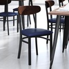 image:imageFlash Furniture Wright Commercial Dining Chair  Walnut Finish Wood Boomerang Back  Black Vinyl Seat  500 LB Capacity Black Steel Frame  Integrated FootrestWalnut Wood BackBlue Vinyl Seat