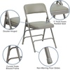 image:imageFlash Furniture HERCULES Series Curved Triple Braced amp Double Hinged Beige Vinyl Metal Folding ChairGray VinylGray Frame