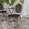 image:imageFlash Furniture Marseille IndoorOutdoor Commercial Bistro Stack Chair  BlackWhite Textilene Back and Seat  LT Natural Bamboo Print Metal Frame  Set of 4BlackNatural Frame