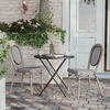 image:imageFlash Furniture Marseille IndoorOutdoor Commercial Bistro Stack Chair  BlackWhite Textilene Back and Seat  LT Natural Bamboo Print Metal Frame  Set of 4Black  WhiteLight Natural Frame