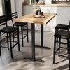 image:imageFlash Furniture Bennett 30 x 48 Solid Wood Commercial Indoor Tabletop in Natural with Dual 5 x 22 Bar Height Black Cast Iron T Bases 400 lb Static CapacityNatural TopBlack Base