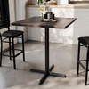 image:imageFlash Furniture Bennett 36 Square Solid Wood Commercial Indoor Tabletop in Natural with 30 x 30 Bar Height Black Cast Iron X Base 400 lb Static CapacityDark Brown TopBlack Base