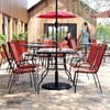 image:imageFlash Furniture Brazos Commercial Outdoor Dining Set 47 Tempered Glass Patio Table with Umbrella Hole 4 Stack Chairs with Flex Comfort Seats and Backs BlackBlackRed
