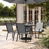 image:imageFlash Furniture Brazos Commercial Outdoor Dining Set 47 Tempered Glass Patio Table with Umbrella Hole 4 Stack Chairs with Flex Comfort Seats and Backs BlackBlackGrey