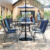 image:imageFlash Furniture Brazos Commercial Outdoor Dining Set 47 Tempered Glass Patio Table with Umbrella Hole 4 Stack Chairs with Flex Comfort Seats and Backs BlackBlackNavy