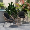 image:imageFlash Furniture Devon 3Piece IndoorOutdoor Bistro Set  Tan Finish Rattan Rope Papasan Style Chairs and Glass Top Side Table  Black Back and Seat Cushions